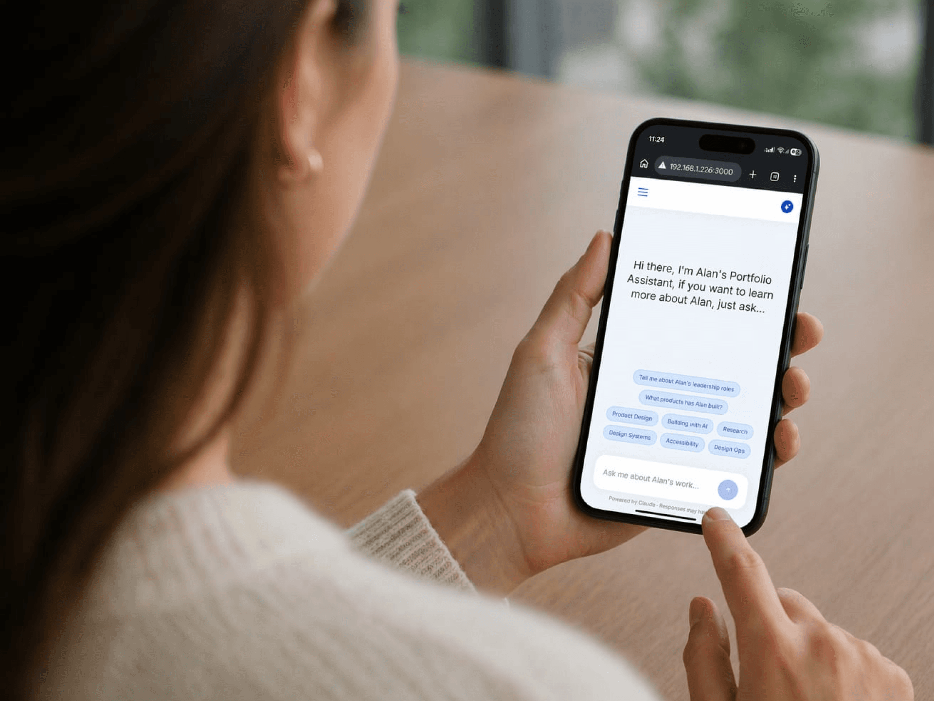 Person using Portfolio Assistant on a mobile phone